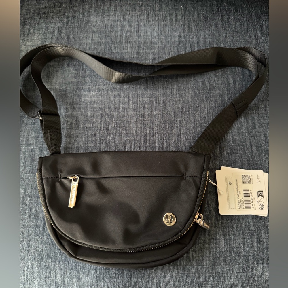 Lululemon all night festival bag 2l black and gold NWT